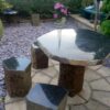 polished basalt table and chairs outdoor