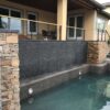 Pebble Water Wall 8 stacked polished pebble tile black water wall 3 e1703112087868